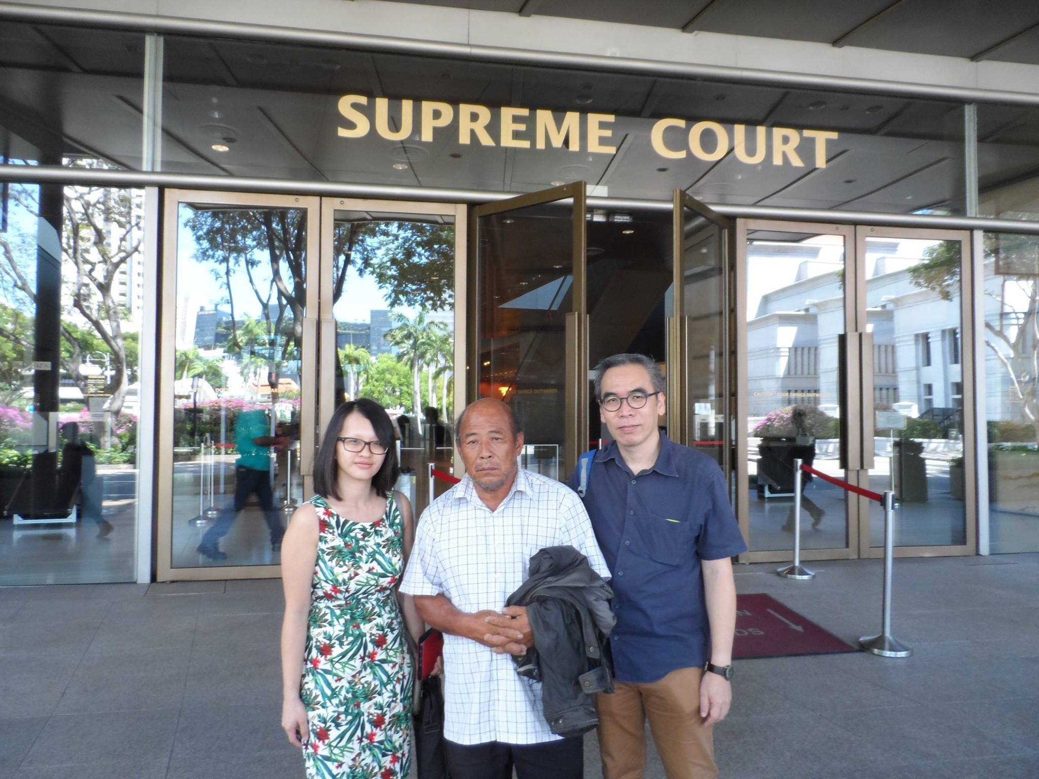 Rachel Zeng (Anti-Death Penalty Activist), Uncle Cheong and Vincent Law (Social Worker) outside the Supreme Court after Chun Yin's resentencing (L-R)