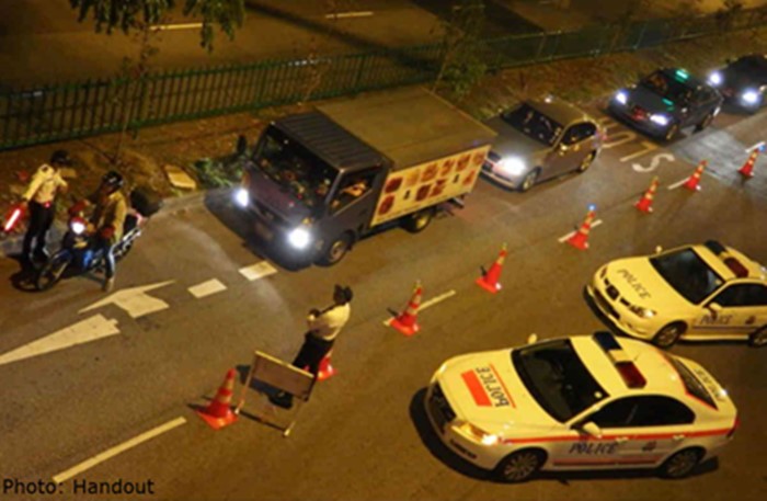 Police roadblock (image - AsiaOne)