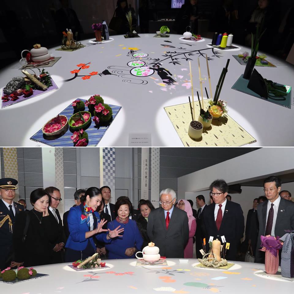 President and Mrs Tan viewing "Shitsurau" at the Panasonic Centre, where indoor spaces such as the dining room table and television console were brought to life with seasonal decorations of flowers, artefacts, technology and more (Source : President Tony Facebook page).