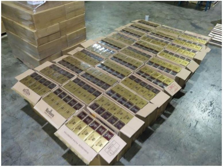 Another 20,600 cartons of duty-unpaid cigarettes stored in two containers parked in a vehicle yard in Pioneer Sector 3 were seized on 23 January 2017 (Source : Singapore Customs).
