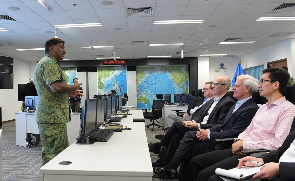 The US congressional delegation receiving a brief at the Changi Regional Humanitarian Assistance and Disaster Relief (HADR) Coordination Centre during a visit to Changi Naval Base / photo: MINDEF